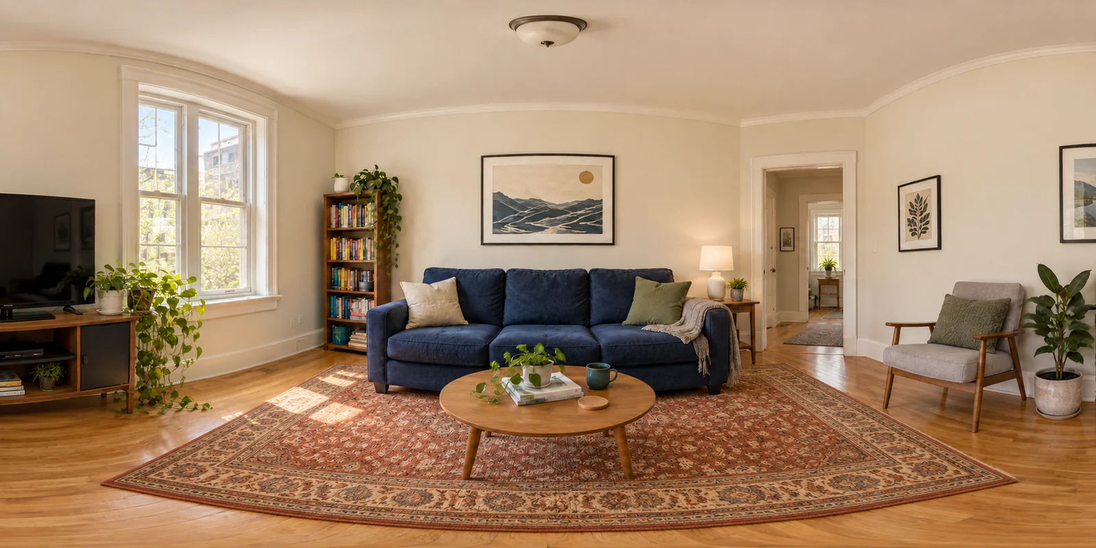 Living room design concept with warm cream walls and a larger patterned rug